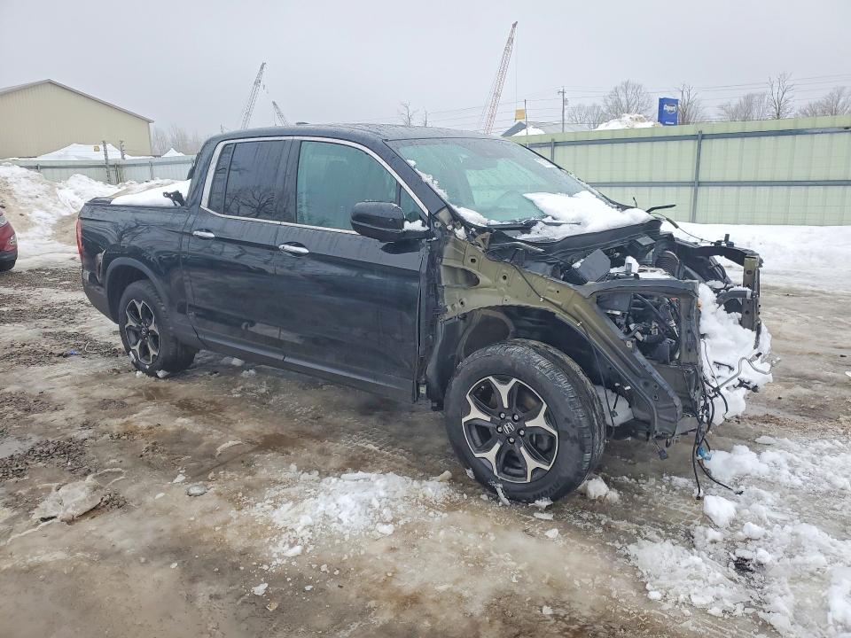 Photo 4 from auction – 2020 HONDA RIDGELINE with VIN 5FPYK3F78LB009352