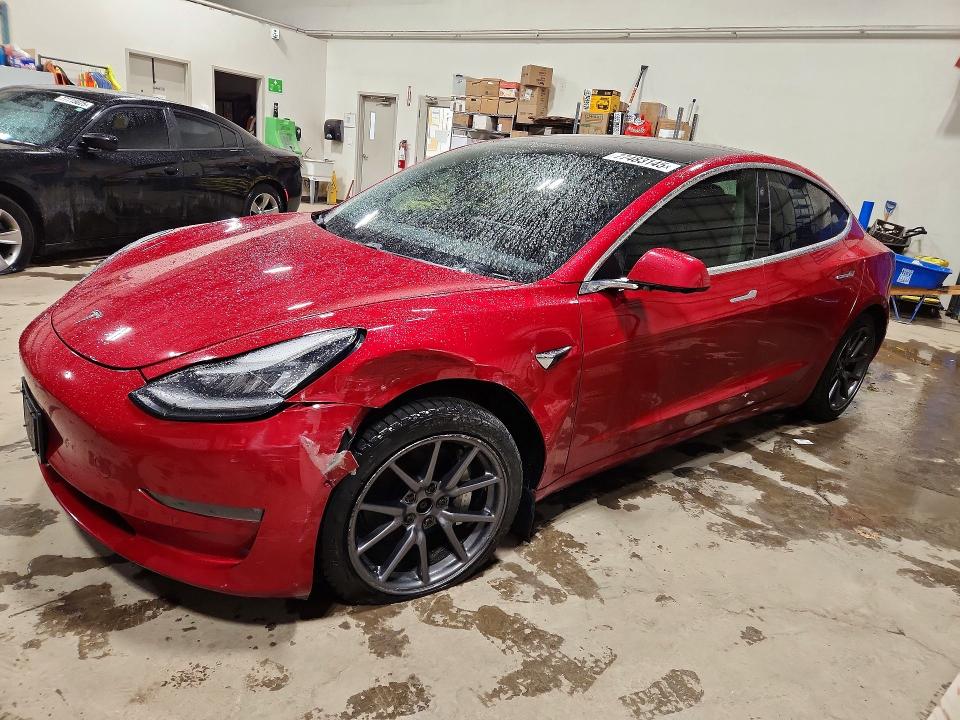 TESLA MODEL 3 2018 with VIN 5YJ3E1EB9JF109574 - Photo from auction