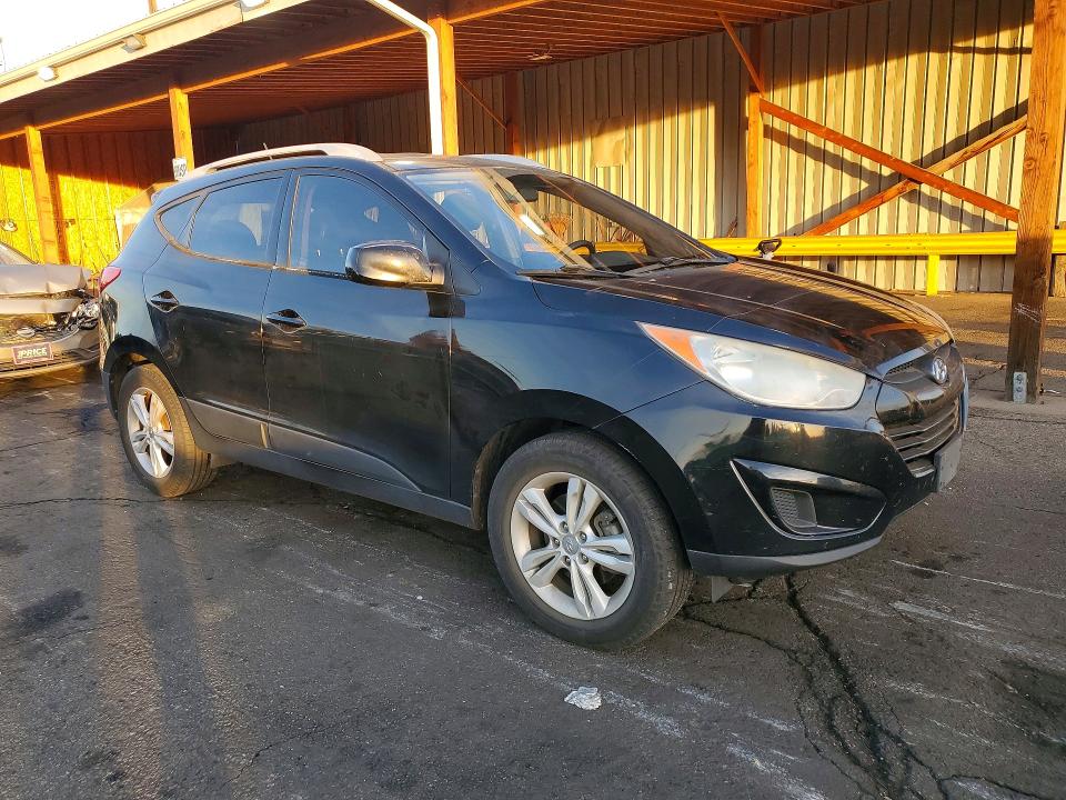 Photo 4 from auction – 2011 HYUNDAI TUCSON GLS with VIN KM8JUCAC7BU271471