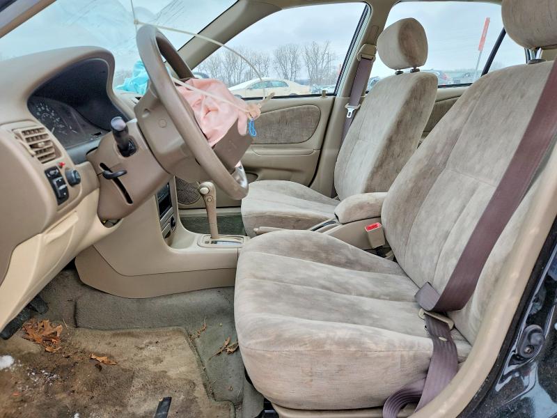 Photo 7 from auction – 1999 TOYOTA COROLLA VE with VIN 1NXBR12E4XZ255925