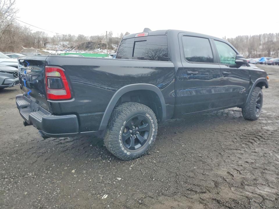 Photo 3 from auction – 2021 RAM 1500 with VIN 1C6SRFLT0MN680196