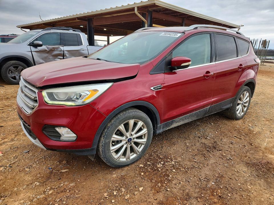 FORD ESCAPE 2017 with VIN 1FMCU0J98HUA57772 - Photo from auction
