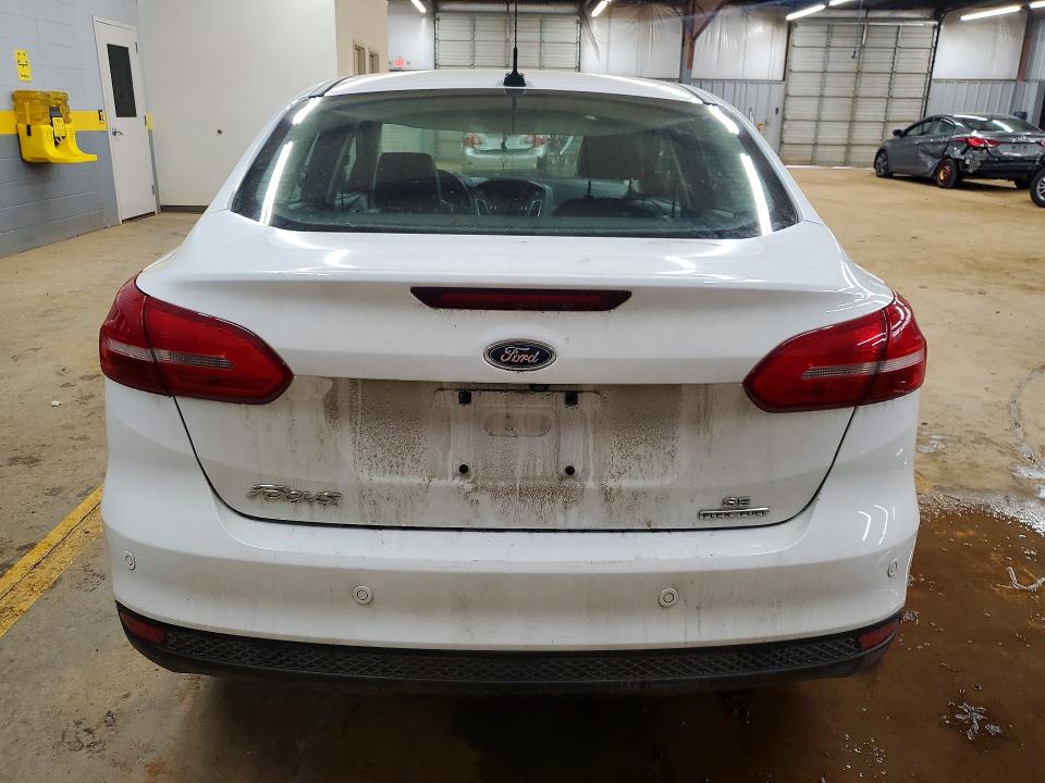 Photo 6 from auction – 2016 FORD FOCUS with VIN 1FADP3F21GL309563