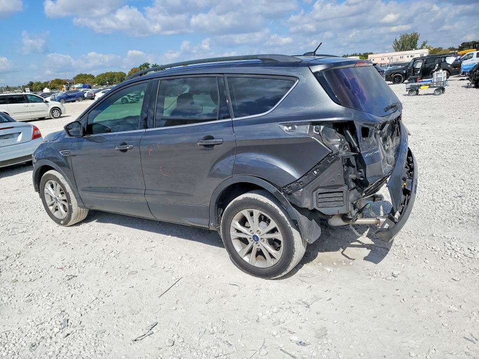 Photo 2 from auction – 2018 FORD ESCAPE with VIN 1FMCU9GD8JUD08182