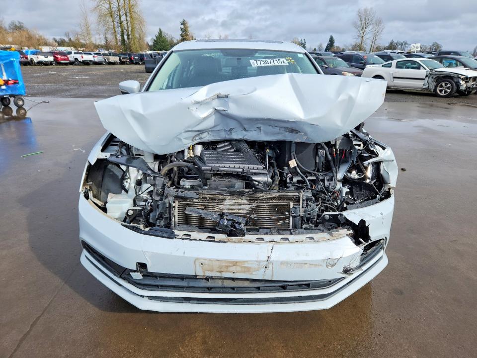 Photo 5 from auction – 2017 VOLKSWAGEN JETTA with VIN 3VWDB7AJ5HM369809