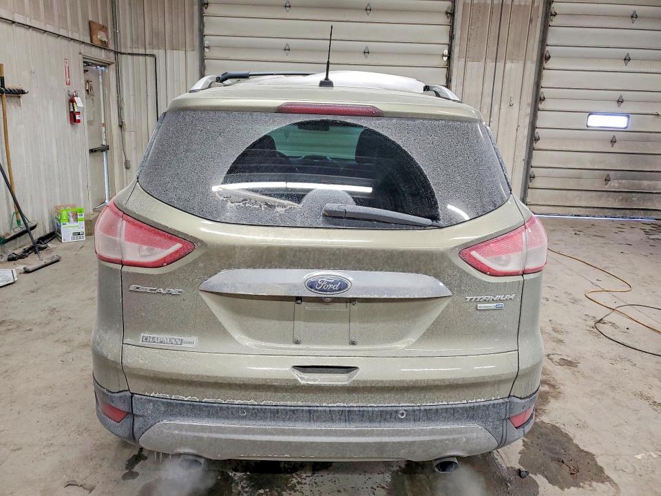Foto 6 de la subasta – 2014 FORD ESCAPE con VIN 1FMCU9J97EUA34662