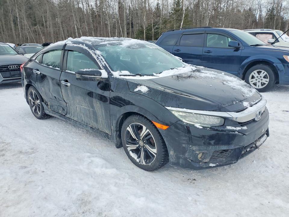 Photo 4 from auction – 2016 HONDA CIVIC with VIN 2HGFC1F94GH110733
