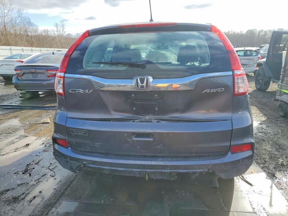 Photo 6 from auction – 2016 HONDA CR-V LX with VIN 5J6RM4H31GL054878
