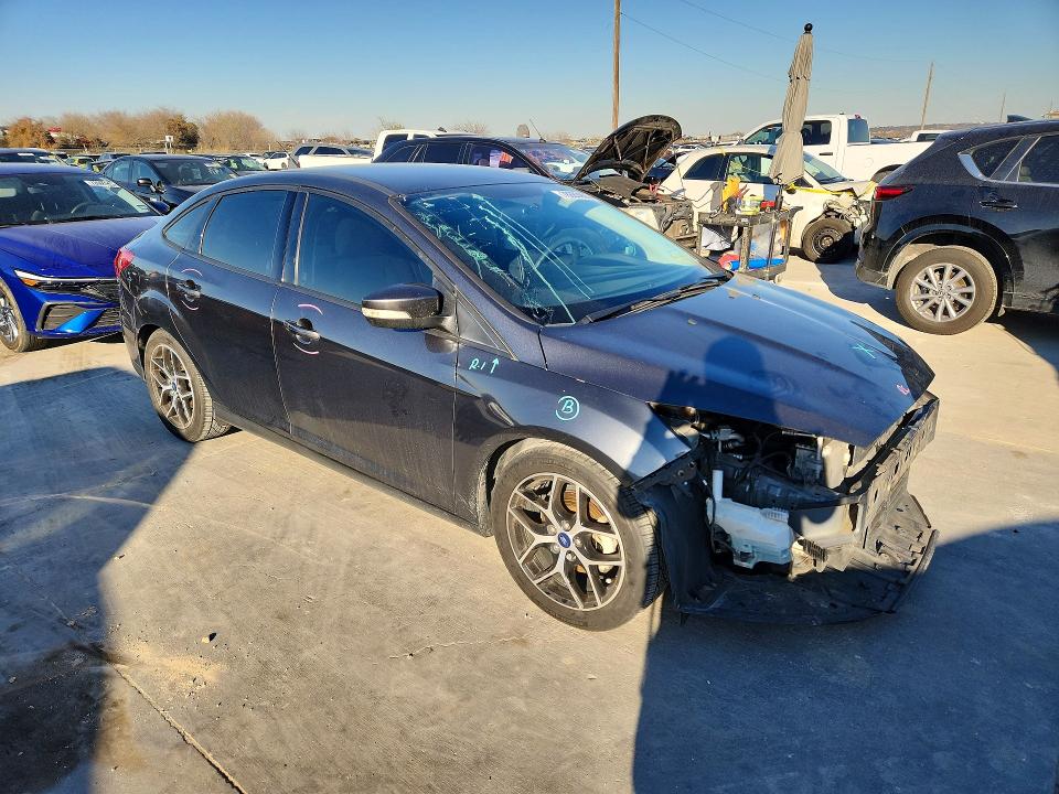 Photo 4 from auction – 2016 FORD FOCUS with VIN 1FADP3FE5GL406808