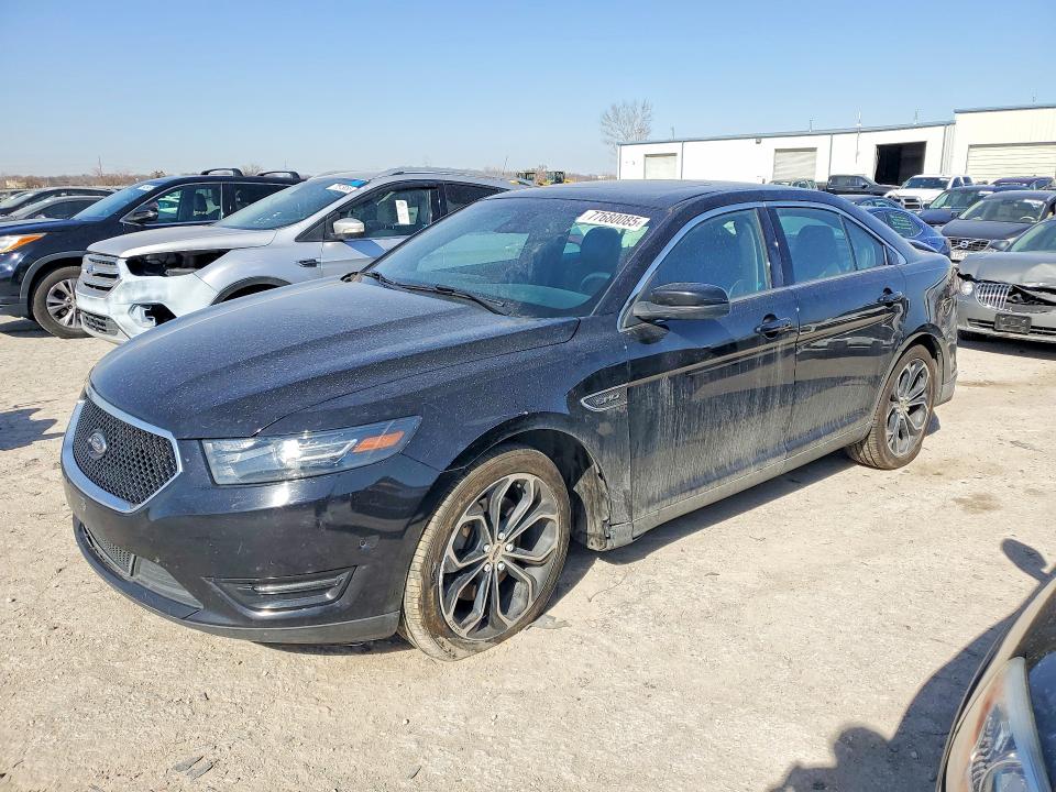 FORD TAURUS 2016 with VIN 1FAHP2KT7GG136098 - Photo from auction