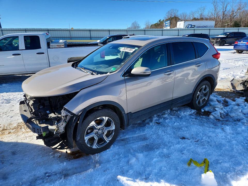 HONDA CR-V EX 2018 with VIN 5J6RW2H55JL004010 - Photo from auction