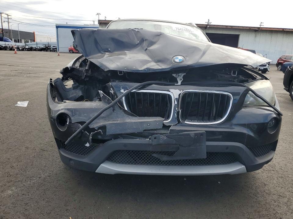 Photo 5 from auction – 2014 BMW X1 SDRIVE2 with VIN WBAVM1C51EVW47134