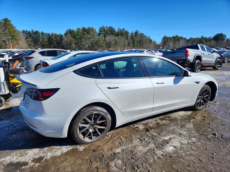 Photo 3 from auction – 2021 TESLA MODEL 3 with VIN 5YJ3E1EB1MF980067