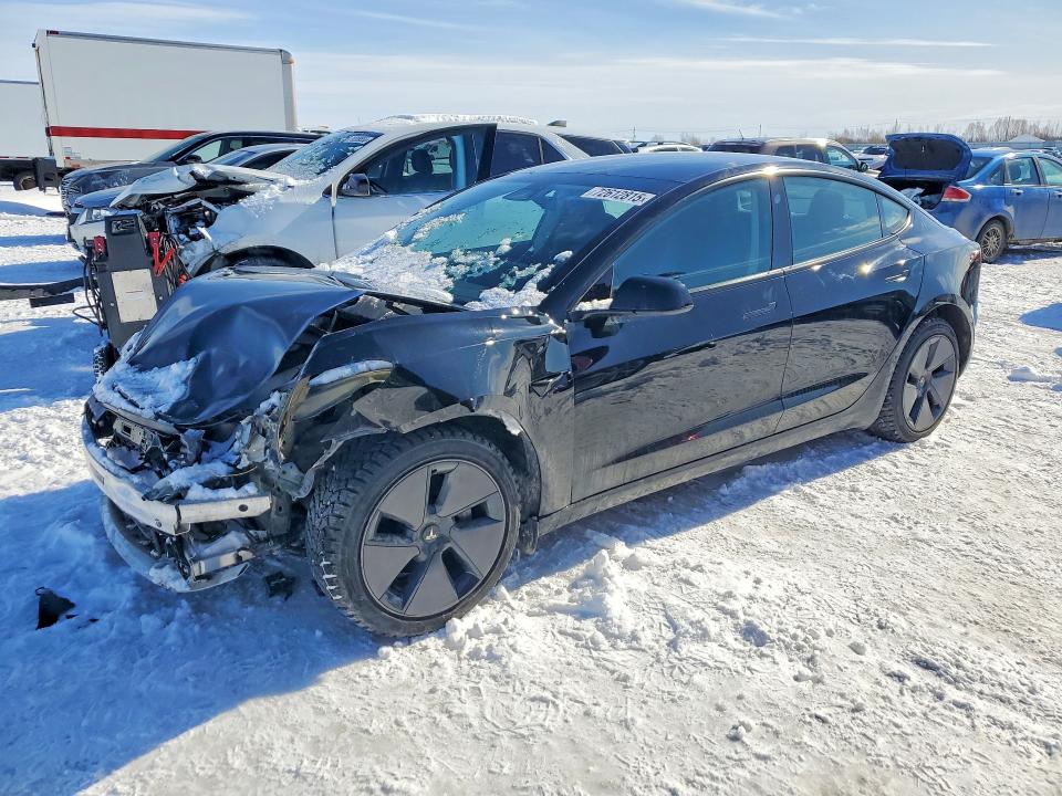 TESLA MODEL 3 2023 with VIN LRW3E1FA5PC872684 - Photo from auction
