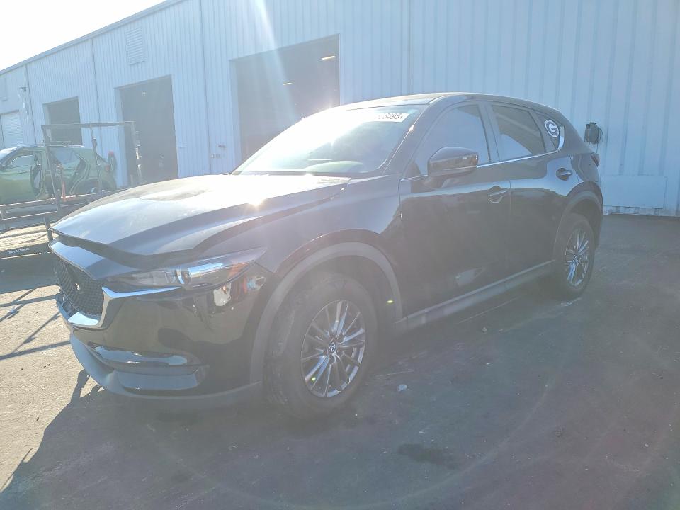 MAZDA CX-5 2021 with VIN JM3KFABM4M0419057 - Photo from auction