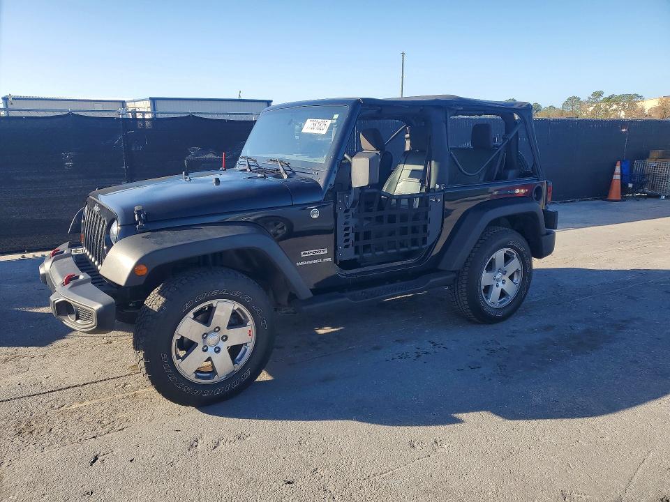 JEEP WRANGLER 2011 with VIN 1J4AA2D18BL608604 - Photo from auction