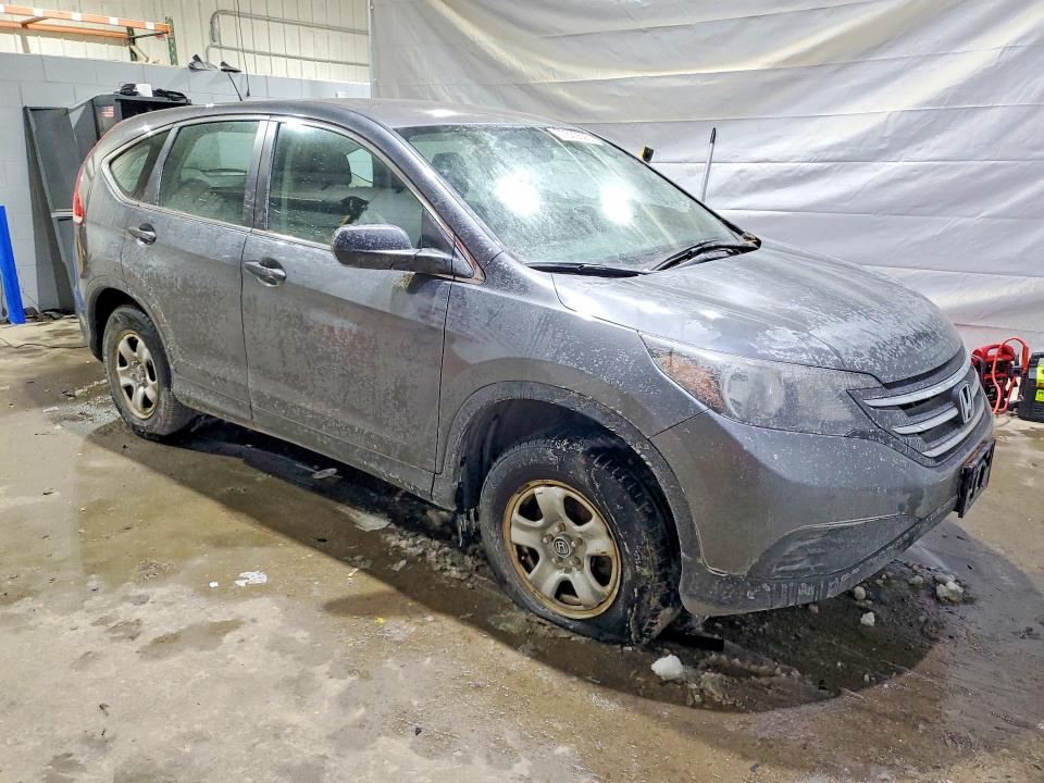 Photo 4 from auction – 2014 HONDA CR-V LX with VIN 2HKRM4H35EH721426