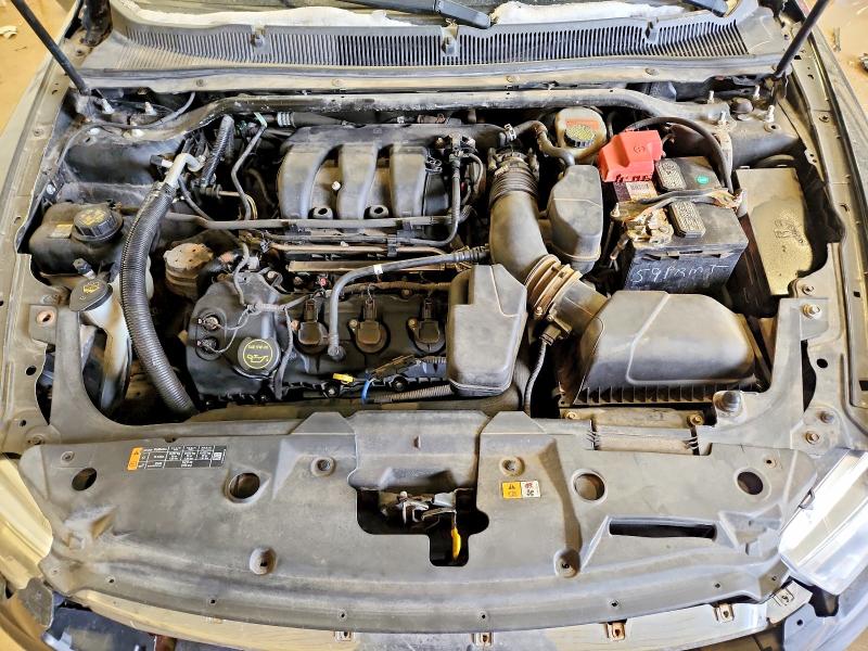 Photo 11 from auction – 2015 FORD TAURUS SEL with VIN 1FAHP2H80FG104112