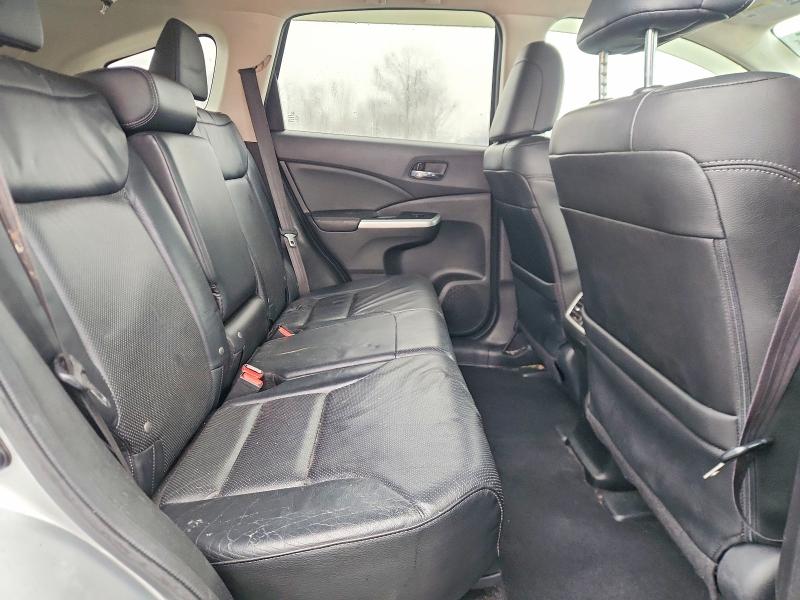 Photo 11 from auction – 2016 HONDA CR-V with VIN 2HKRM4H77GH600466