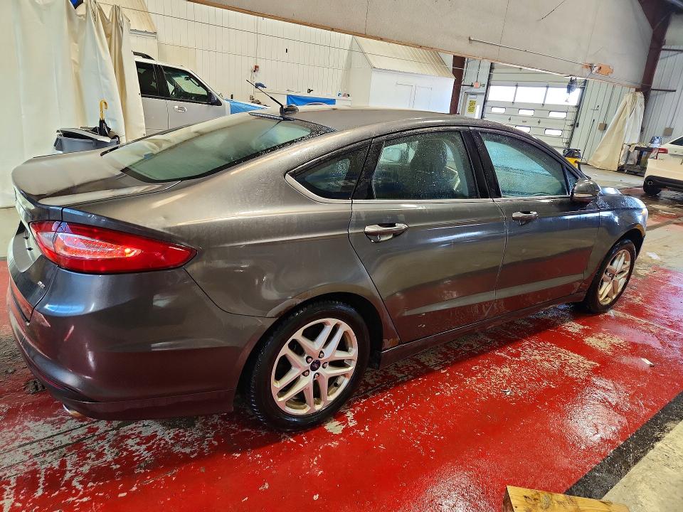 Photo 3 from auction – 2016 FORD FUSION with VIN 3FA6P0H70GR361669