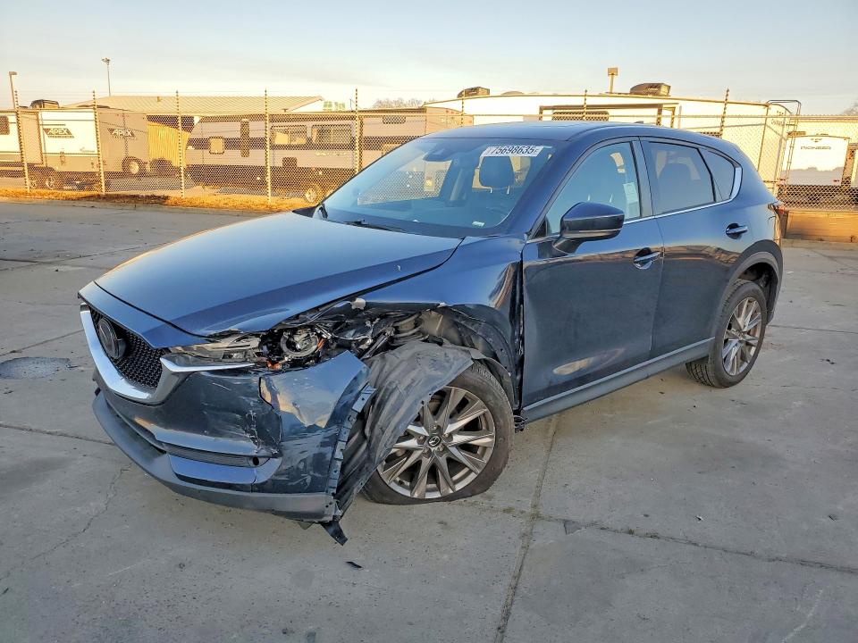 MAZDA CX-5 2021 with VIN JM3KFBDM9M1386554 - Photo from auction