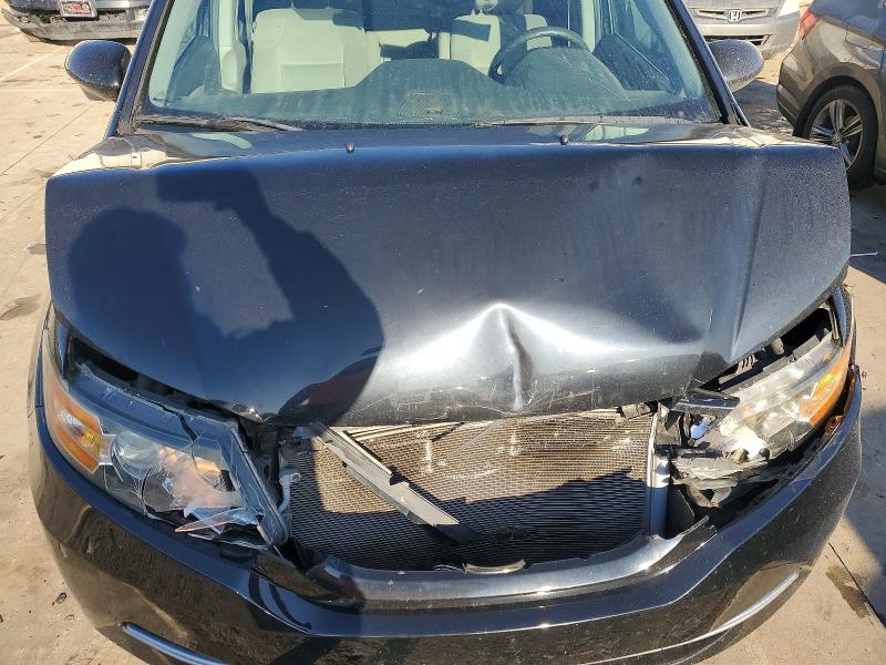 Photo 12 from auction – 2014 HONDA ODYSSEY with VIN 5FNRL5H47EB025778