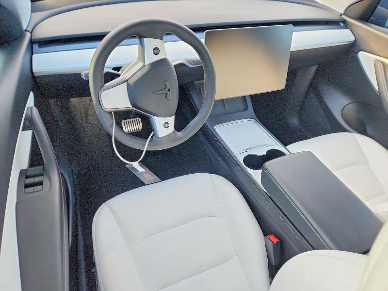 Photo 8 from auction – 2022 TESLA MODEL Y with VIN 7SAYGDEE2NF339641