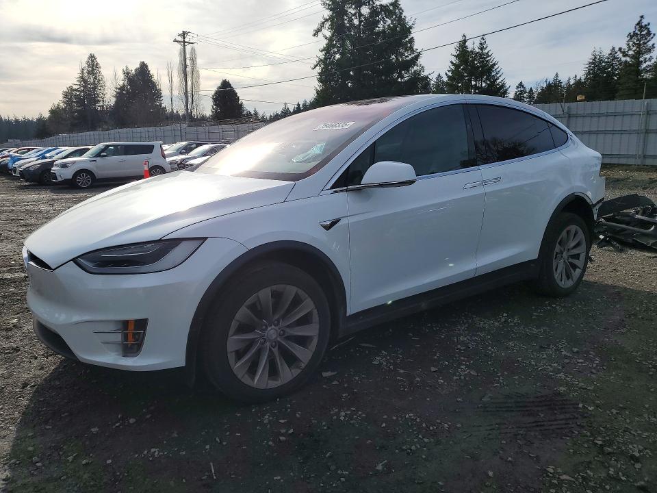 TESLA MODEL X 2018 with VIN 5YJXCBE29JF104470 - Photo from auction