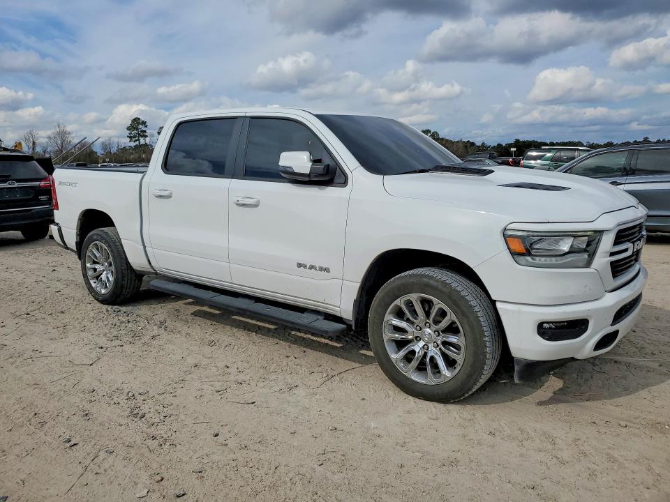 Photo 4 from auction – 2023 RAM 1500 with VIN 1C6SRFJTXPN638268