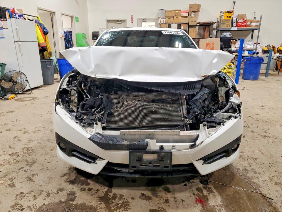 Photo 5 from auction – 2018 HONDA CIVIC with VIN 2HGFC3A36JH450567