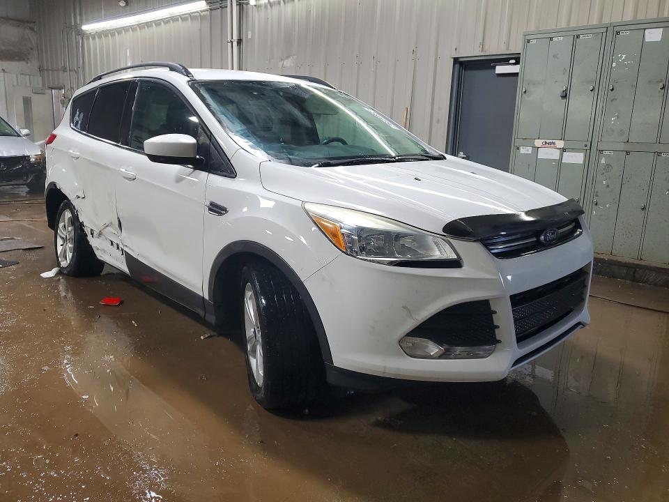 Photo 4 from auction – 2016 FORD ESCAPE SE with VIN 1FMCU9GX2GUA93305