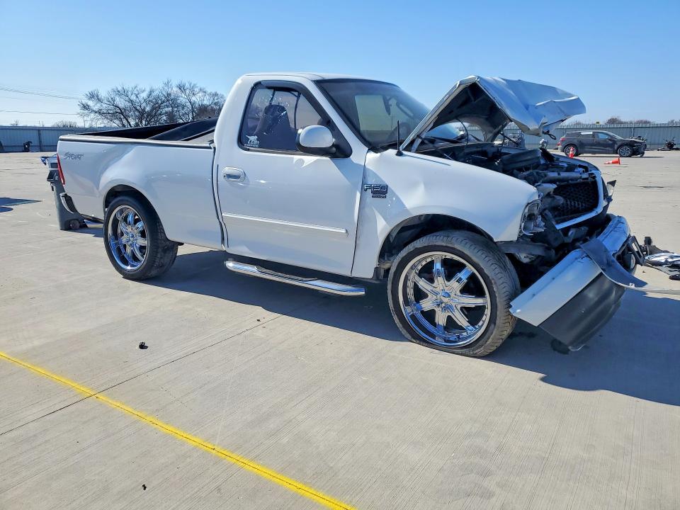 Photo 4 from auction – 2002 FORD F150 with VIN 1FTRF17W12NB16531