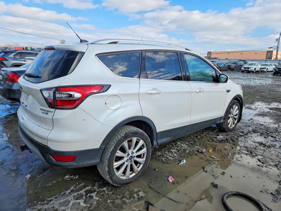 Photo 3 from auction – 2017 FORD ESCAPE with VIN 1FMCU9J96HUA74400