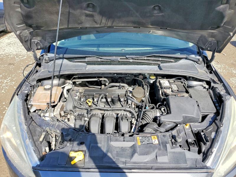 Photo 11 from auction – 2015 FORD FOCUS S with VIN 1FADP3E21FL256492