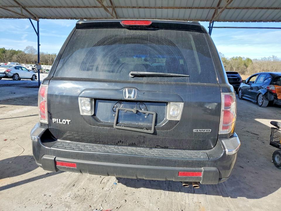 Photo 6 from auction – 2006 HONDA PILOT EX with VIN 5FNYF18616B022955