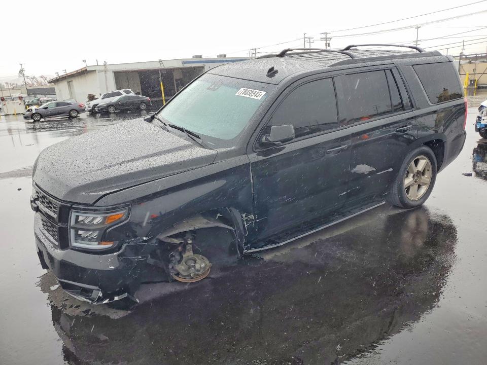 CHEVROLET TAHOE 2015 with VIN 1GNSCBKC2FR147418 - Photo from auction