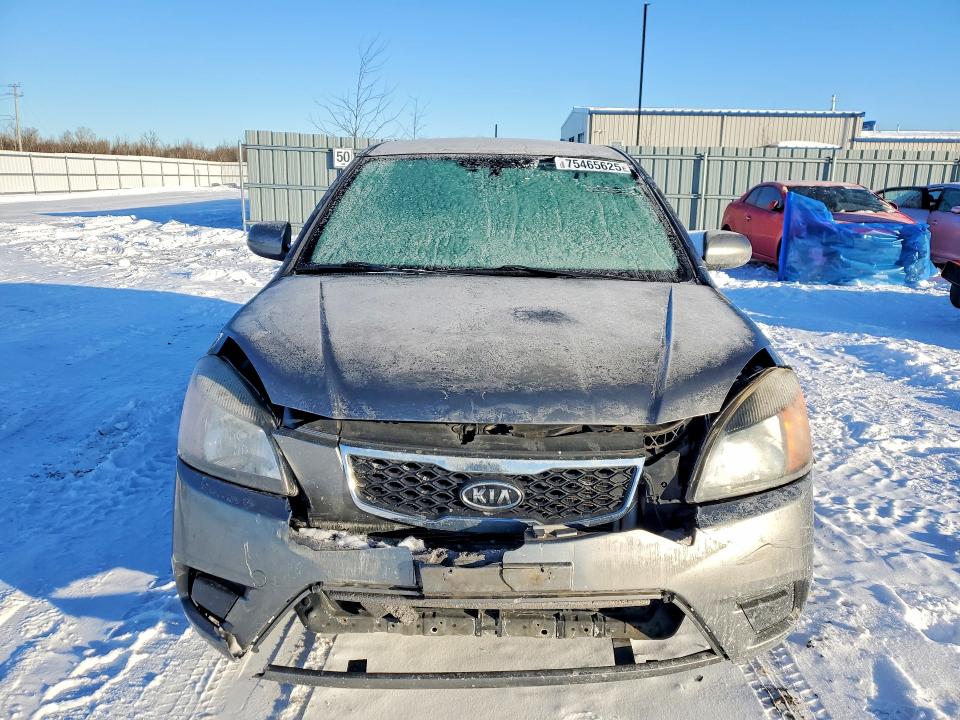 Photo 5 from auction – 2011 KIA RIO BASE with VIN KNADH5B33B6747863