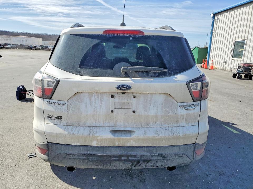 Photo 6 from auction – 2017 FORD ESCAPE with VIN 1FMCU0J92HUB21417