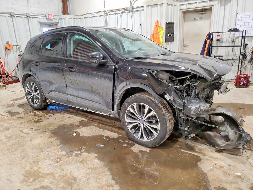 Photo 4 from auction – 2021 FORD ESCAPE with VIN 1FMCU9H93MUB18997