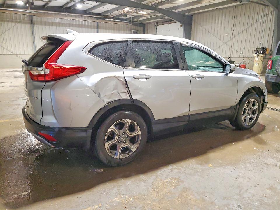 Photo 3 from auction – 2018 HONDA CR-V with VIN 2HKRW2H80JH693099