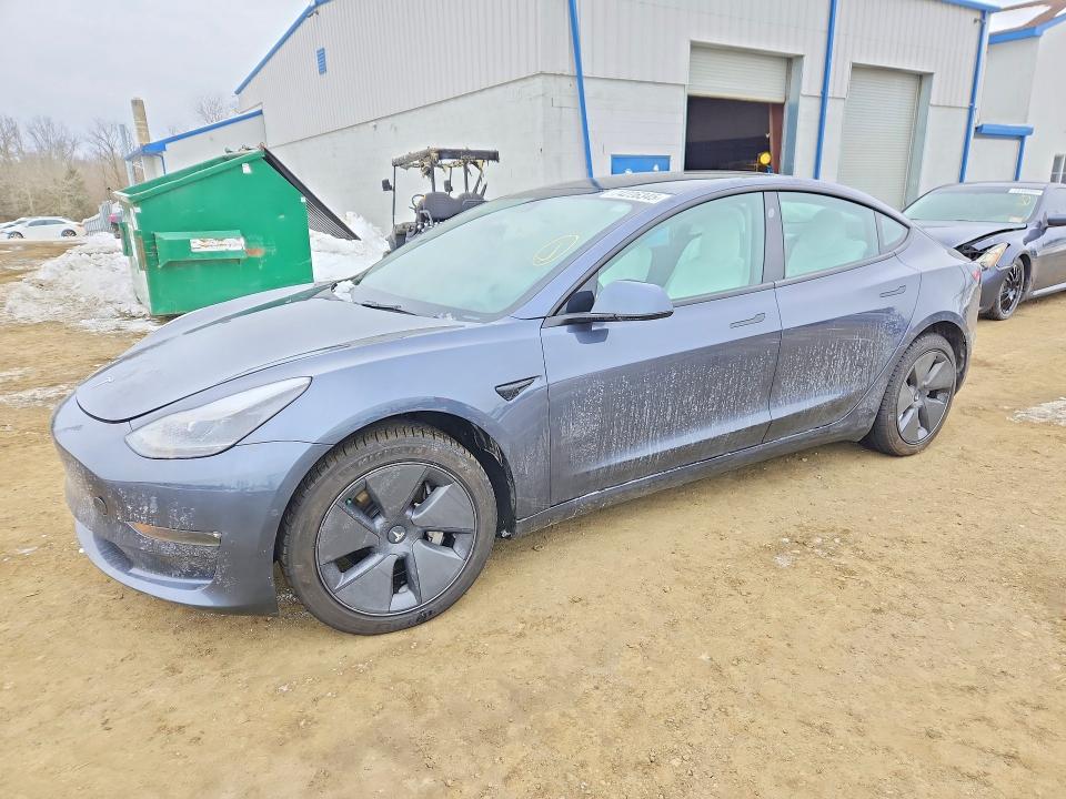 TESLA MODEL 3 2022 with VIN 5YJ3E1EB4NF337147 - Photo from auction