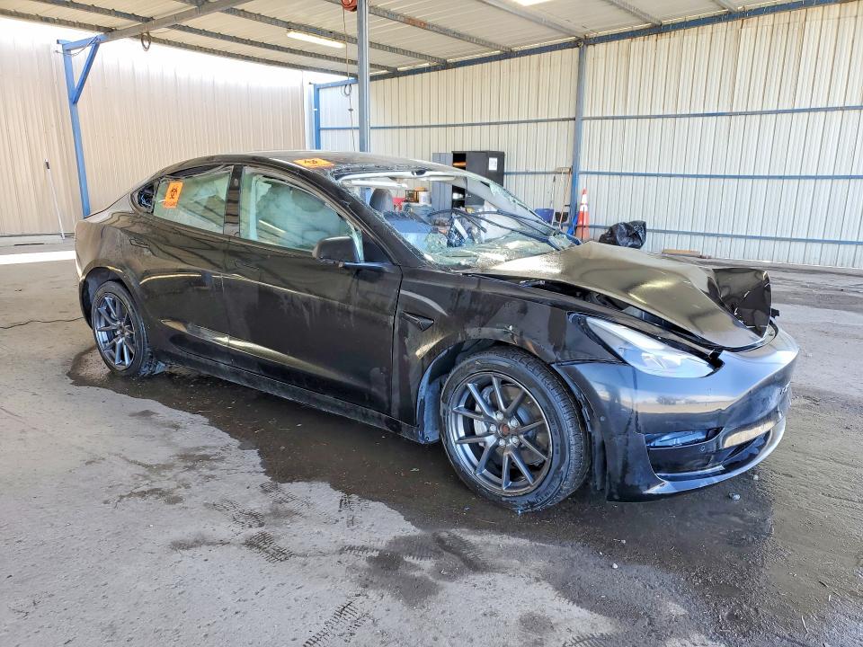 Photo 4 from auction – 2022 TESLA MODEL 3 with VIN 5YJ3E1EB2NF187877