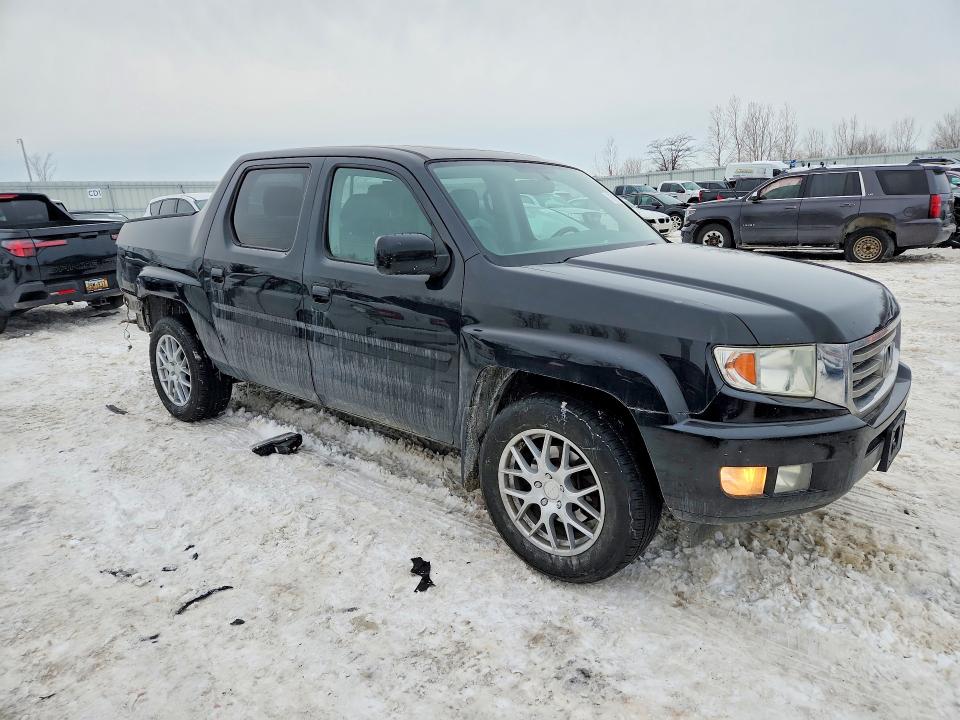 Photo 4 from auction – 2013 HONDA RIDGELINE with VIN 5FPYK1F53DB009862