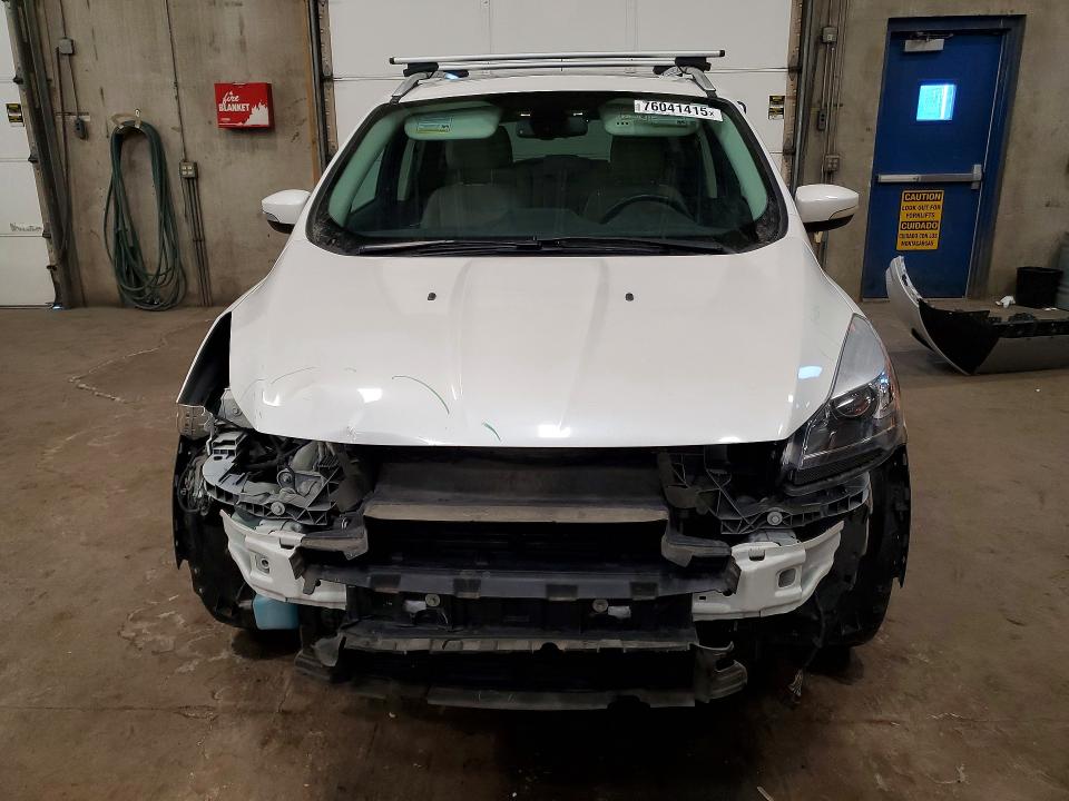 Photo 5 from auction – 2015 FORD ESCAPE with VIN 1FMCU9JXXFUA79059