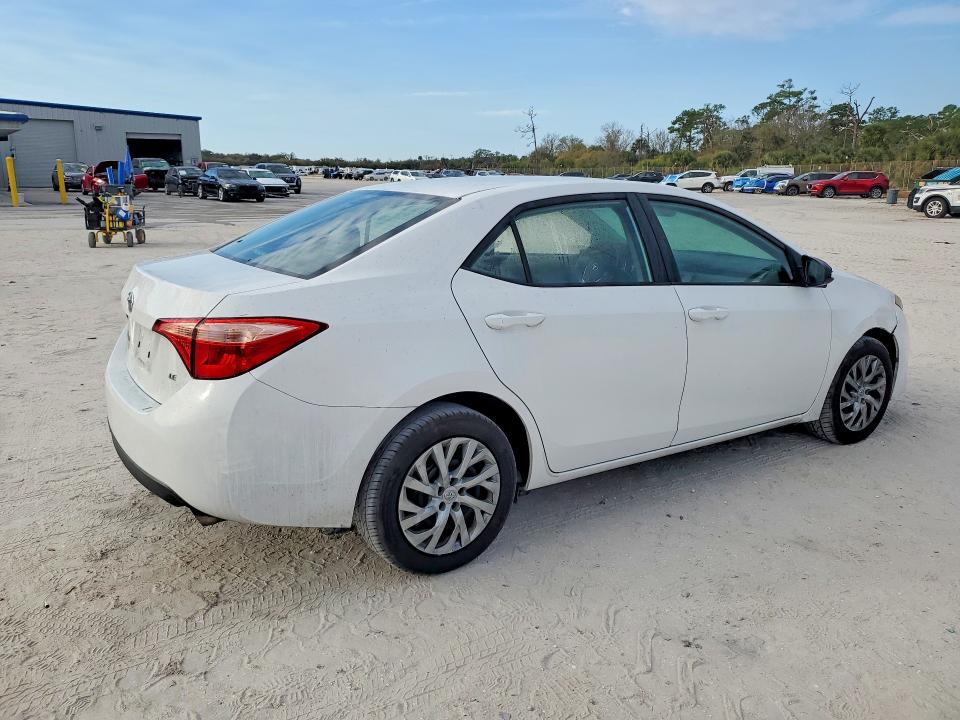 Photo 3 from auction – 2018 TOYOTA COROLLA L with VIN 5YFBURHE7JP843928