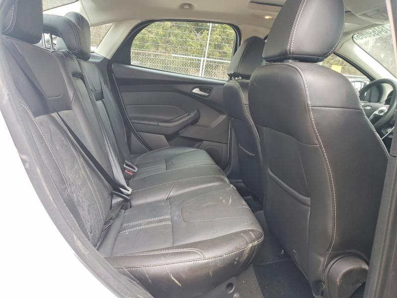 Photo 10 from auction – 2014 FORD FOCUS with VIN 1FADP3F2XEL310420