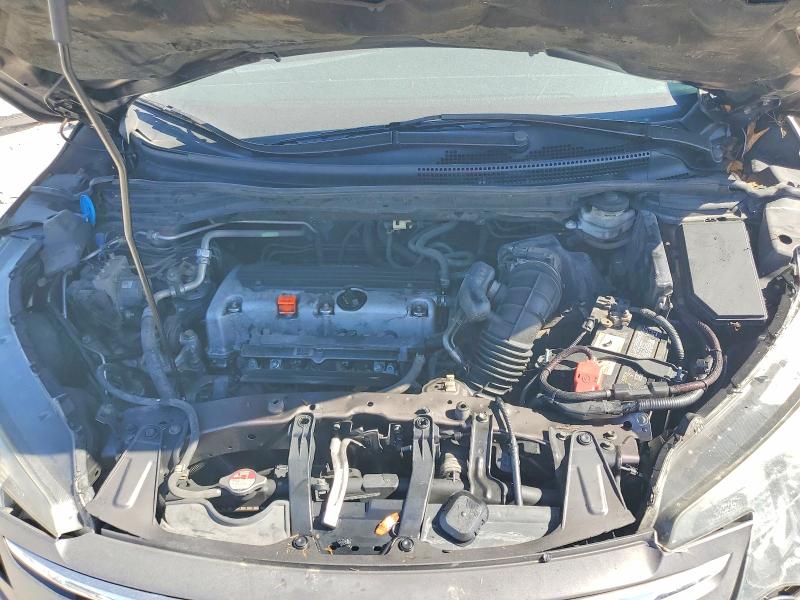 Photo 12 from auction – 2014 HONDA CR-V LX with VIN 3CZRM3H34EG712617