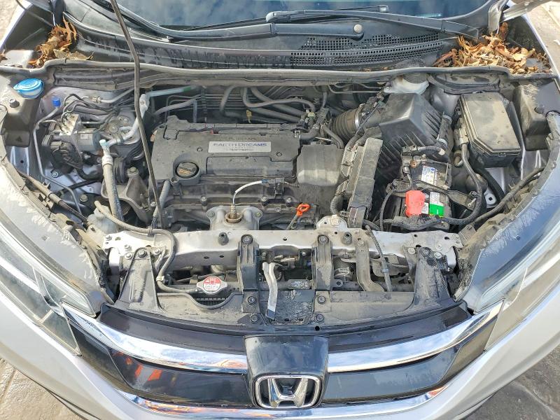 Photo 12 from auction – 2015 HONDA CR-V LX with VIN 3CZRM3H34FG711520