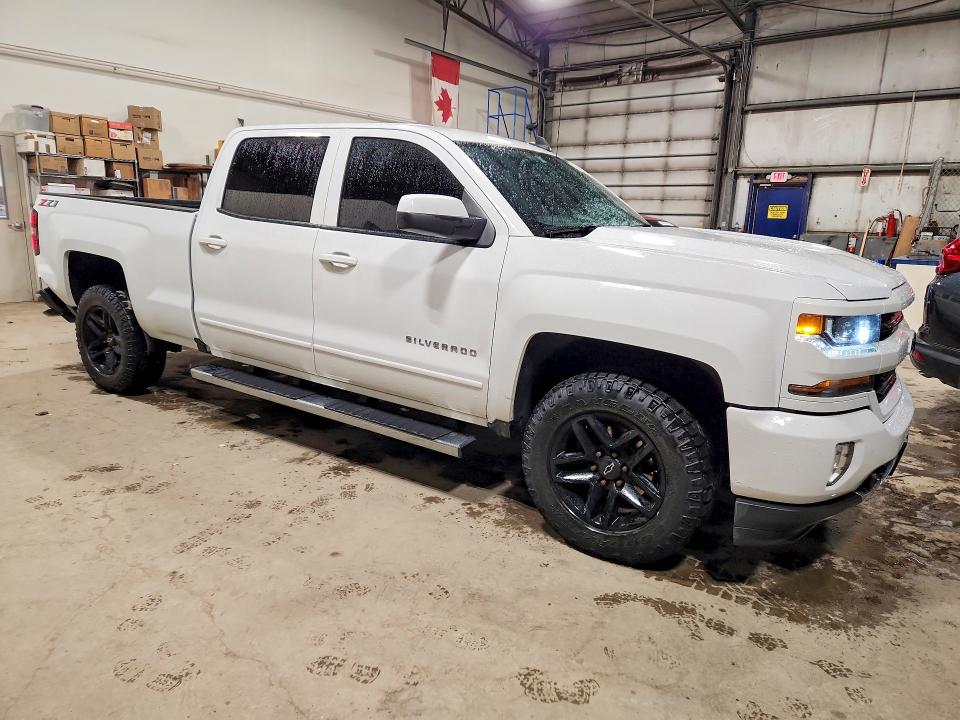 Photo 4 from auction – 2018 CHEVROLET SILVERADO with VIN 3GCUKREC9JG475971