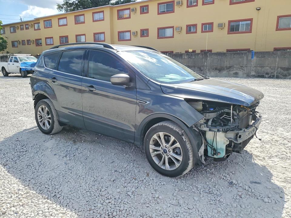 Photo 4 from auction – 2018 FORD ESCAPE with VIN 1FMCU9GD8JUD08182